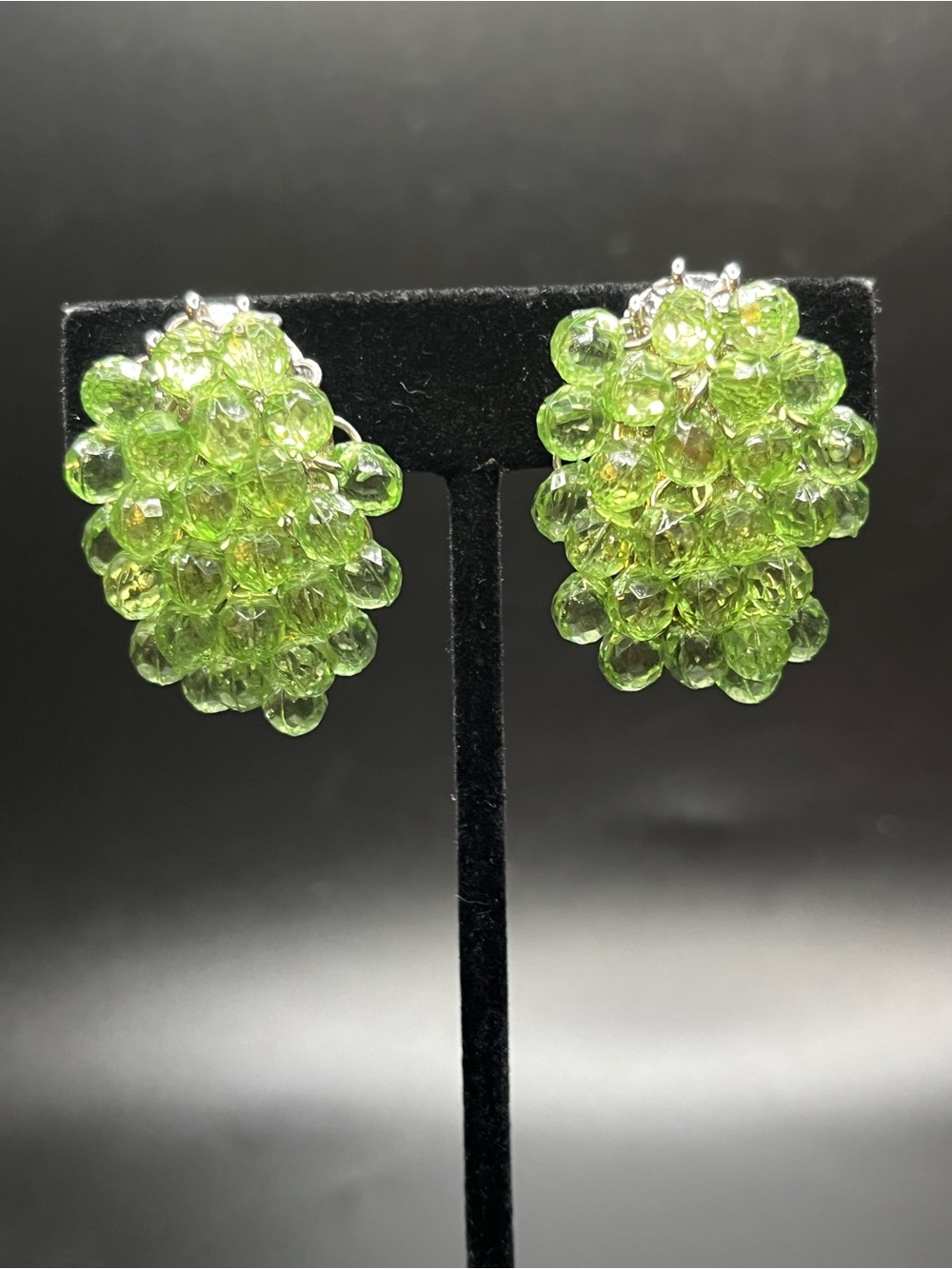 Beautiful vintage statement earrings featuring bright faceted lime green glass s